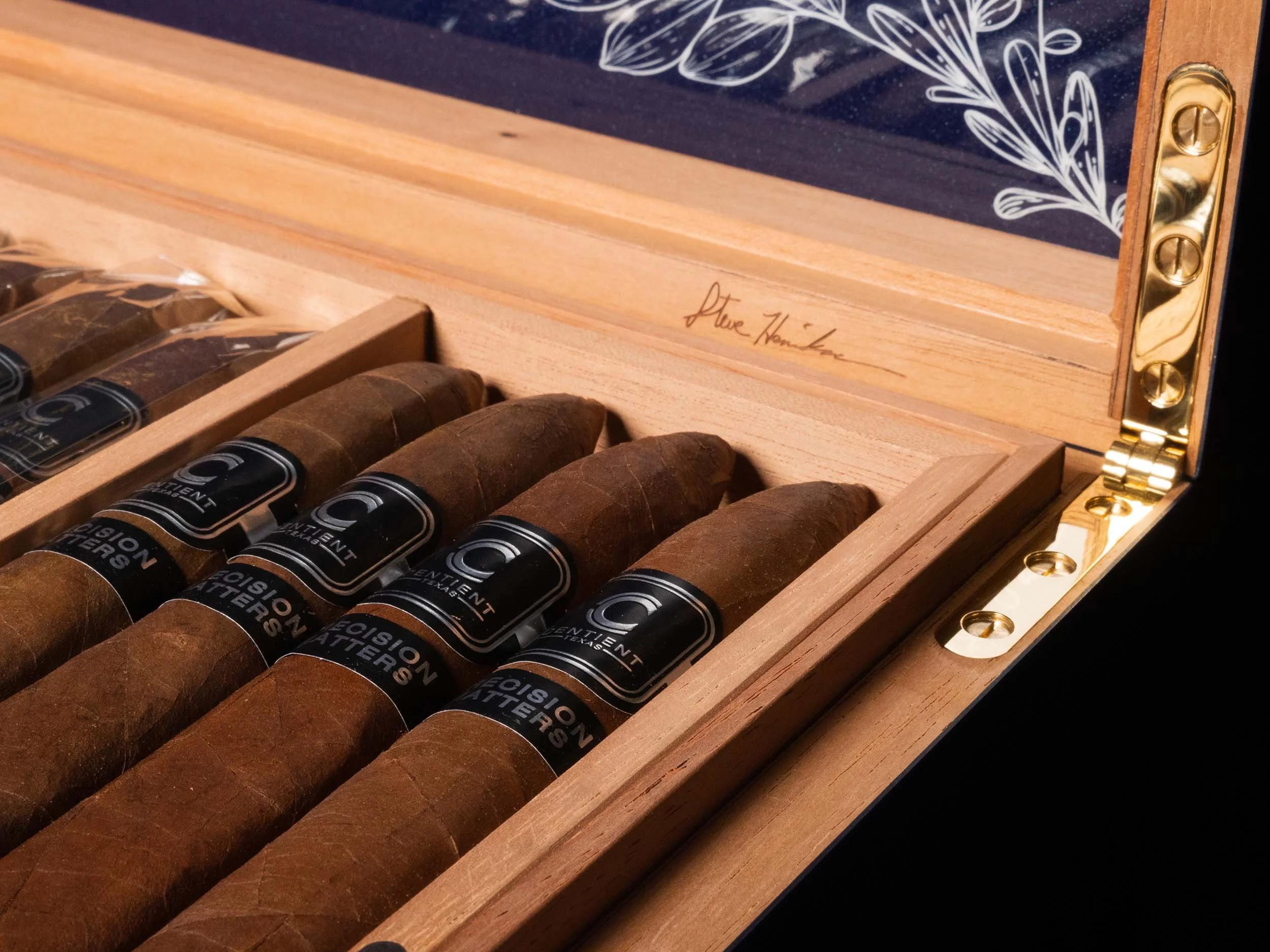 A wooden box of hand-rolled premium cigars